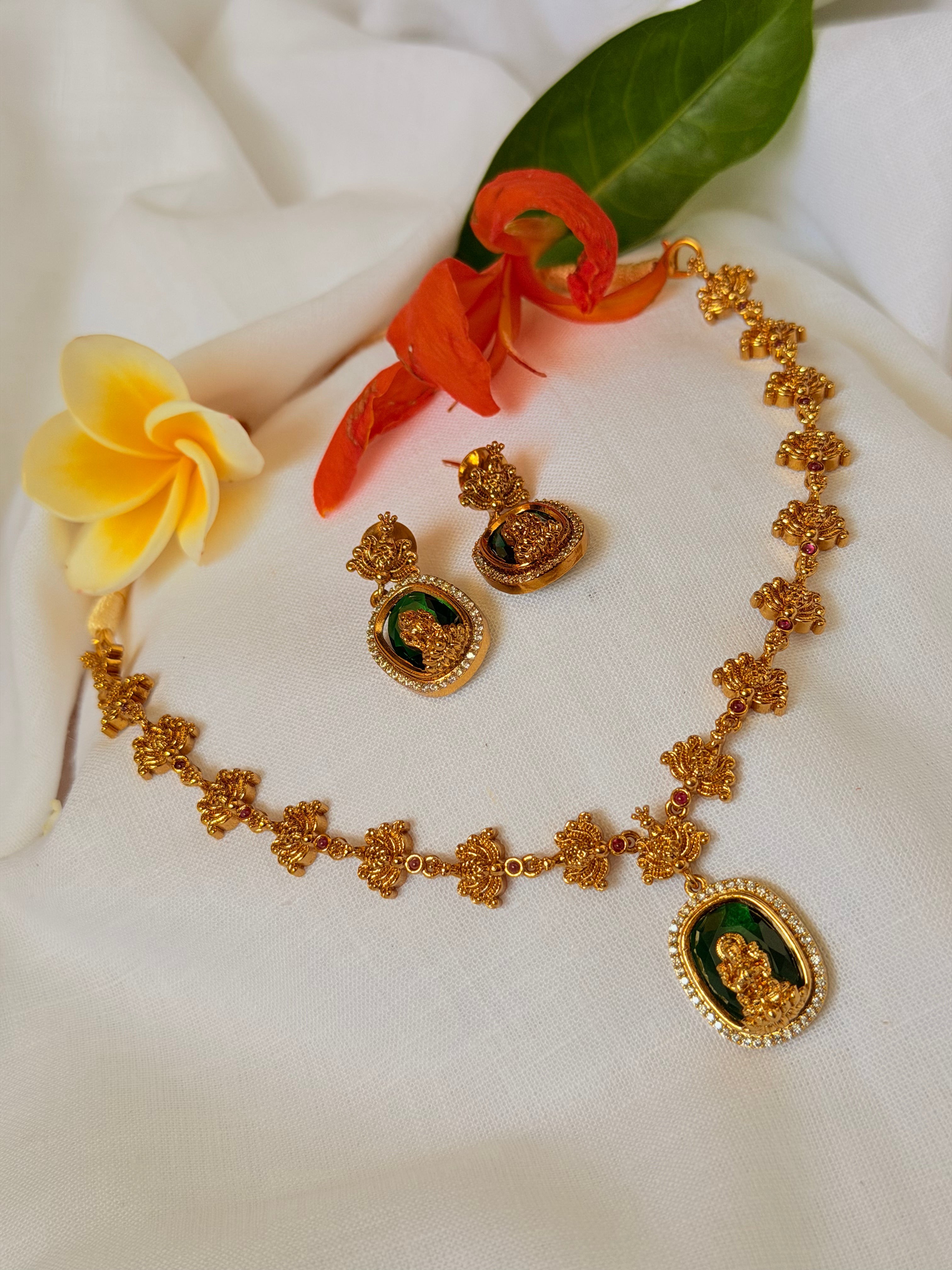 Aarvika Lakshmi Emerald Pendant Temple Choker Set - Aarvika Lakshmi Emerald Pendant Temple Choker Set (1)